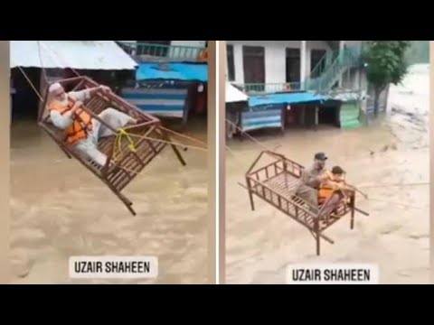 Inondazioni in Pakistan: le reti dei letti usate per trascinare le persone fuori dall’acqua