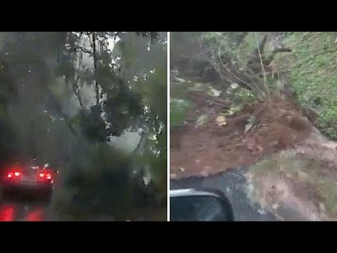 In Salvador, filmano la frana in diretta dall’auto mentre fanno retromarcia per non restare…