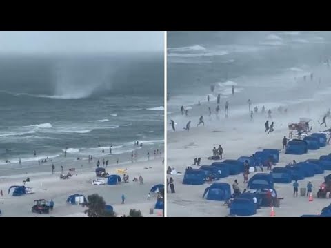 Tromba marina arriva su una spiaggia della Florida: volano oggetti, la gente fugge