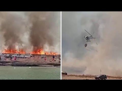 Il video degli incendi a Trapani, in Sicilia: la spola dell’elicottero per spegnere le fiamme