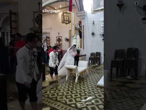 Il tifone non ferma il matrimonio: la coppia si sposa nella chiesa allagata