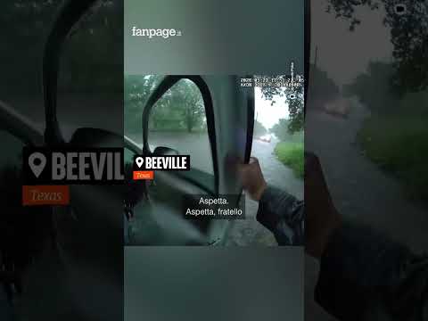 Poliziotto salva un bambino intrappolato in un auto sommersa