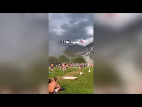 La tempesta sul lago di Lugano spaventa i bagnanti che scappano via